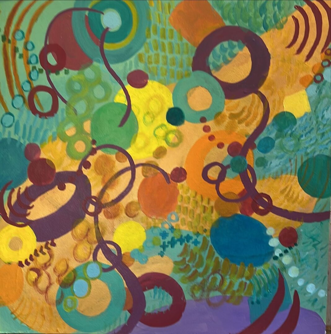 A painting of various colors and shapes in the background.